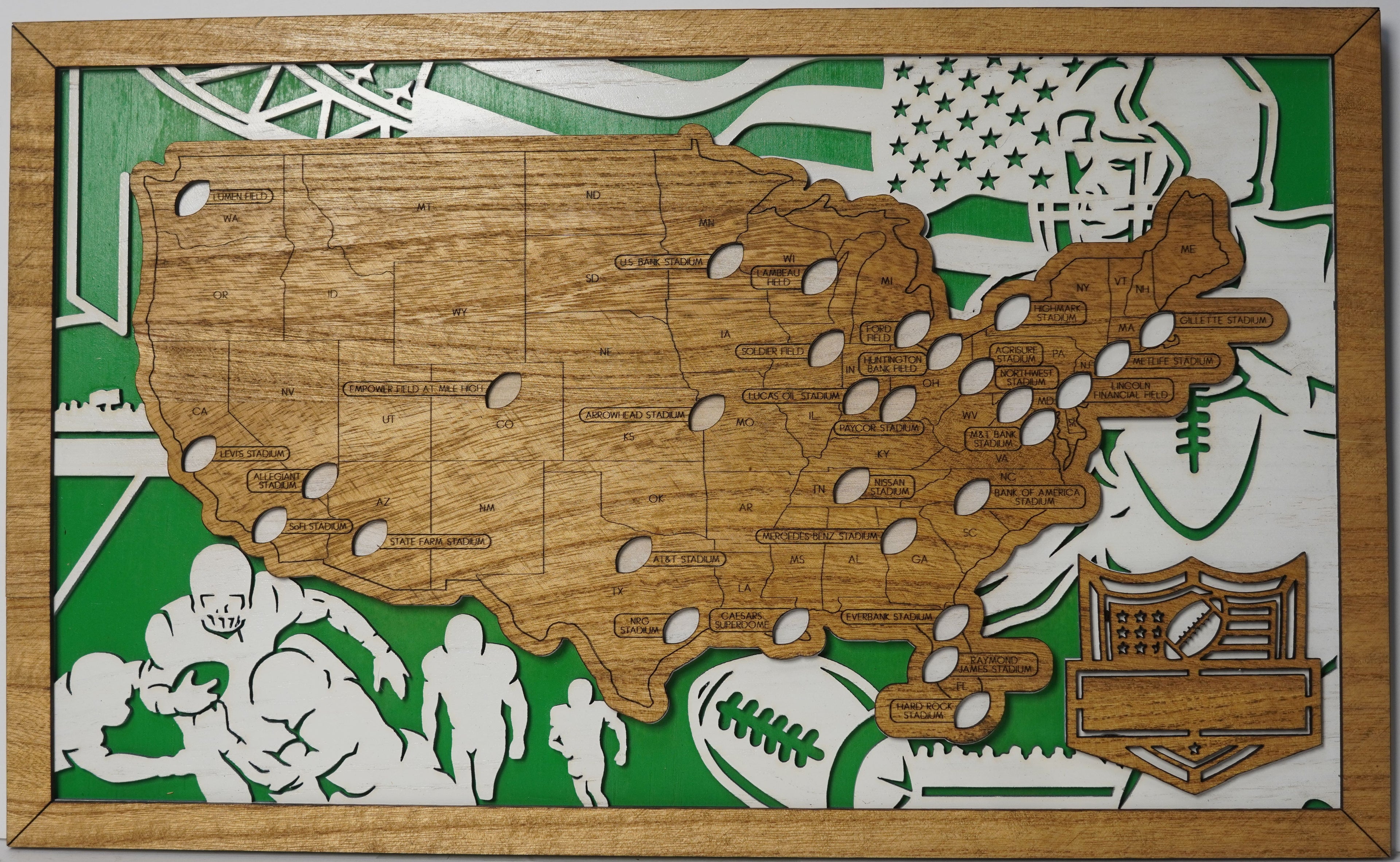 Wooden map of the United States with various symbols on a green background