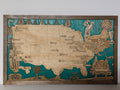 Golf course travel map handcrafted from wood